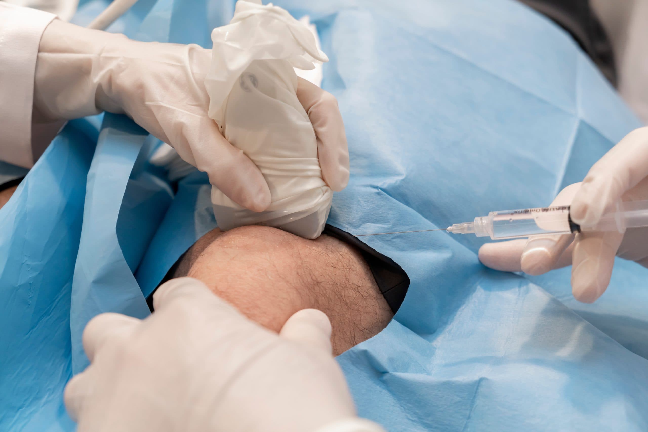Professor Lee preparing a regenerative joint injection