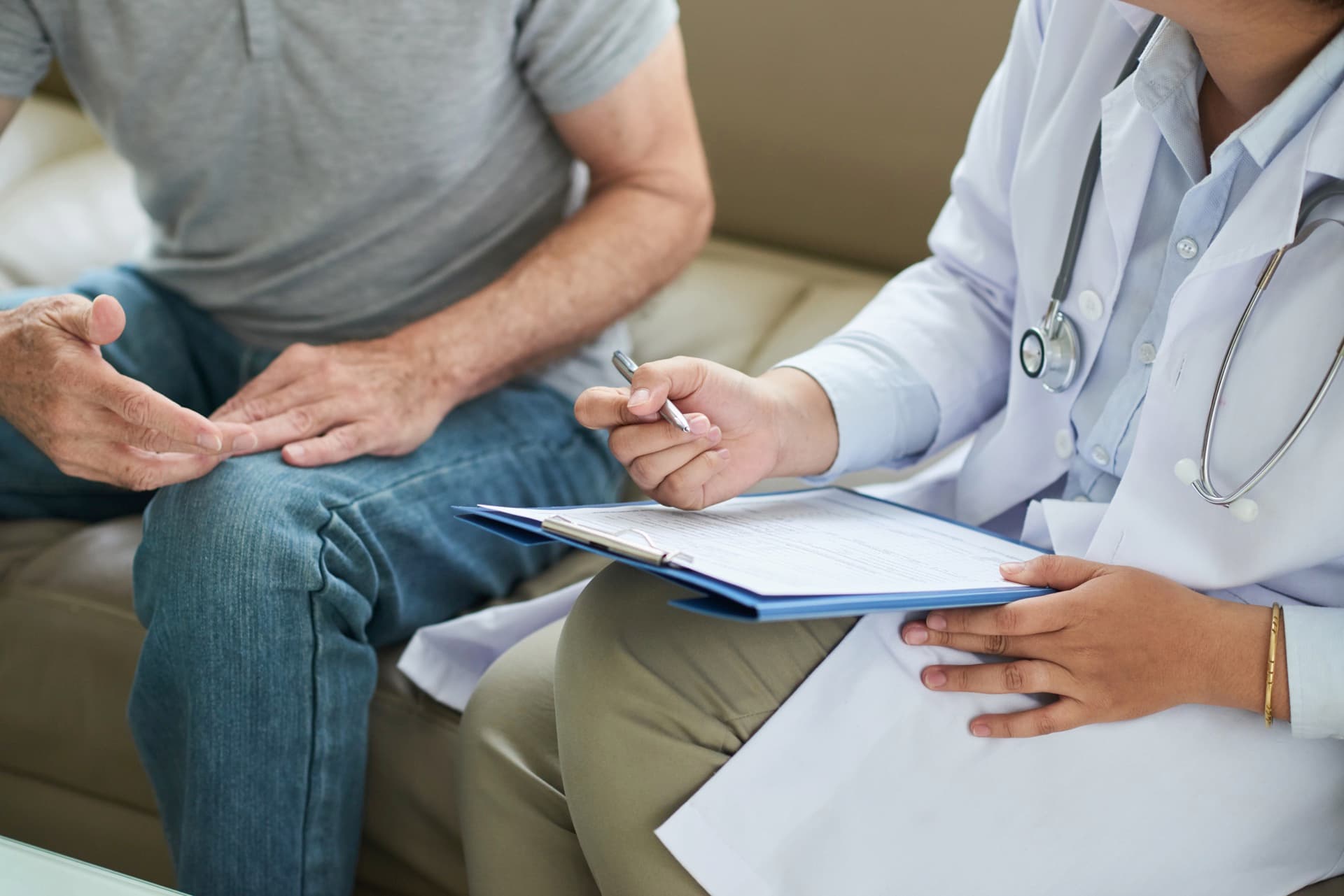 Specialist discussing treatment options with patient